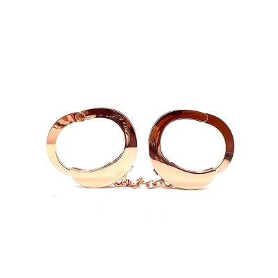 UFO HANDCUFFS – GOLD